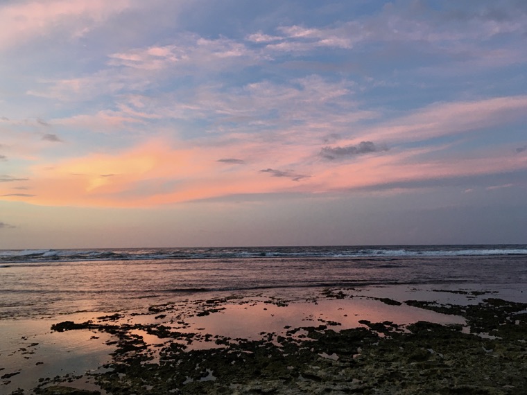 Beach and pink sky at the end of the day.