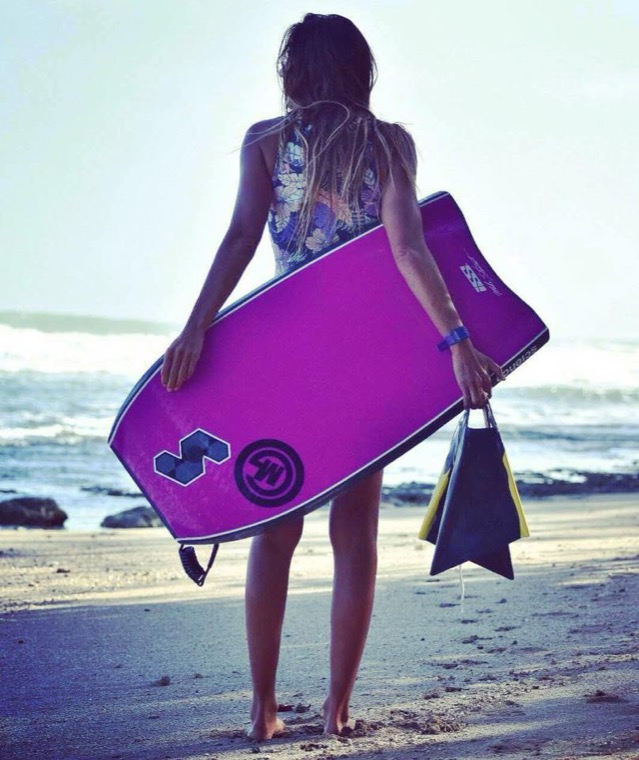 Anne-Cécile from behind with her pink board.